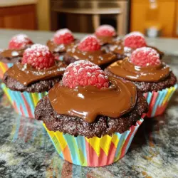 Nutella stuffed chocolate raspberry cupcakes are a sweet treat that combines rich chocolate and tart raspberries. Each bite reveals a gooey center of Nutella, making them unique. The cupcake base is soft and moist, thanks to the buttermilk. The raspberries add a burst of flavor that balances the sweetness of the chocolate.