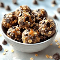 To make No-Bake Chocolate Chip Energy Bites, you need these items: - 1 cup rolled oats - ½ cup natural peanut butter - ¼ cup honey or maple syrup - ½ cup mini chocolate chips - ¼ cup ground flaxseed - 1 tsp vanilla extract - A pinch of sea salt These ingredients work together to create a tasty and healthy snack. The rolled oats provide fiber and energy. Natural peanut butter gives protein and good fats. Honey or maple syrup adds sweetness, while mini chocolate chips bring joy. Ground flaxseed adds omega-3s and boosts nutrition. Vanilla extract and sea salt enhance the flavors. You can make your energy bites even better with these optional add-ins: - Chopped nuts - Dried fruits - Coconut flakes Chopped nuts add crunch and extra nutrients. Dried fruits bring a burst of flavor and natural sweetness. Coconut flakes provide a tropical twist. Feel free to mix and match these add-ins for your own unique bites. These energy bites offer great health benefits: - Health advantages of oats: Oats are full of fiber. They help with digestion and keep you full longer. They also lower cholesterol and control blood sugar levels. - Benefits of peanut butter: Peanut butter is rich in protein and healthy fats. It helps build muscle and provides energy for your day. It also contains vitamins and minerals. - Importance of flaxseed: Flaxseed is a tiny powerhouse of nutrients. It offers omega-3 fatty acids, which are good for your heart. It also provides fiber, helping you feel full and satisfied. These ingredients not only taste good but also nourish your body. Enjoy making them and feel good about what you eat! For the full recipe and instructions, check out the [Full Recipe]. Mixing the dry ingredients Start by taking a large mixing bowl. Add 1 cup of rolled oats, ¼ cup of ground flaxseed, and a pinch of sea salt. Stir these dry ingredients well. This step gives your energy bites a solid base. Combining wet ingredients In a separate bowl, mix ½ cup of natural peanut butter, ¼ cup of honey or maple syrup, and 1 teaspoon of vanilla extract. Stir the mixture until it is smooth and creamy. This will add sweetness and flavor to your bites. Mixing everything together Now, pour the wet mixture into the bowl with the dry ingredients. Use a spatula or wooden spoon to stir everything together. Make sure it’s well combined. Then, fold in ½ cup of mini chocolate chips. This gives your bites a delightful chocolatey taste. Forming bite-size balls Once your mixture is ready, scoop out small portions. Aim for about 1 inch in diameter for each ball. You can use your hands to roll them into perfect circles. This is where the fun begins! Best methods for rolling If the mixture sticks to your hands, dampen them slightly with water. This makes rolling easier. If you prefer, you can use a small cookie scoop for uniform bites. It’s a quick way to get them all the same size. Refrigeration time Place the rolled energy bites on a parchment-lined baking sheet or plate. Put them in the fridge for at least 30 minutes. This helps them firm up and hold their shape. Serving suggestions After chilling, you can serve your energy bites in a small bowl or on a cute plate. For an extra touch, sprinkle some mini chocolate chips around them. Enjoy these tasty bites as a healthy snack, and feel free to experiment with different add-ins! For the full recipe, refer to the section above. How to add protein powder You can boost your energy bites by adding protein powder. Start with one scoop of your favorite protein powder. Mix it in with the dry ingredients. This will help you get more protein in your snack. Modifying sweetness levels Sweetness is key to making these bites tasty. If you like things sweeter, add more honey or maple syrup. You can also use stevia or agave. Just be careful not to add too much, or it may change the texture. Ensuring proper consistency The mix should be sticky but not too wet. If it feels too dry, add a bit of peanut butter or honey. If it’s too wet, add more oats or ground flaxseed. This helps keep the bites from falling apart. Not over-mixing or under-mixing Mixing is important, but don’t overdo it. If you mix too much, the oats can break down. Just mix until all ingredients are combined. You want to see the oats and chocolate chips throughout the mix. Best containers for storage Use an airtight container to store your energy bites. Glass or plastic containers work well. You can also use a zip-lock bag for easy storage and access. Tips for maintaining freshness Keep your energy bites in the fridge to keep them fresh longer. They can last up to a week. If you want to save them for later, put them in the freezer. Just remember to thaw them before eating. {{image_2}} You can change the flavor of your energy bites easily. Here are two fun ideas: - Chocolate Almond Energy Bites: Swap out the peanut butter for almond butter. Add 1/4 cup of finely chopped almonds to boost the nutty taste. This mix gives you a rich flavor that is hard to resist. - Coconut Lime Energy Bites: Use 1/4 cup of shredded coconut instead of chocolate chips. Add a teaspoon of lime zest for a refreshing twist. This version is bright and tropical, perfect for summer. If you have dietary needs, you can still enjoy these bites. Here’s how to make them fit: - Vegan-friendly substitutions: Use maple syrup instead of honey. Choose a nut butter that is free from animal products. This way, everyone can enjoy them! - Gluten-free version adjustments: Ensure your oats are certified gluten-free. This small change allows those with gluten sensitivities to join in the fun without worry. Change up your energy bites based on the seasons. Here are some ideas: - Fall-inspired pumpkin spice bites: Add 1/4 cup of pure pumpkin and 1/2 teaspoon of pumpkin pie spice. These bites will warm you up as the weather cools. - Summer berry-infused bites: Mix in 1/4 cup of dried berries like cranberries or blueberries. This adds a burst of fruity flavor that brightens your snack time. For the full recipe, check out the [Full Recipe]. Store your no-bake chocolate chip energy bites in the refrigerator. Place them in a sealed container. This keeps them fresh and tasty. They will last well for up to one week. If you want to enjoy them longer, make sure to check the container every few days. For long-term storage, freezing is a great option. You can freeze energy bites for up to three months. To freeze, place the bites on a baking sheet. Make sure they are not touching. Freeze them for about two hours. Then, transfer them to a freezer-safe bag. When you want to eat them, simply take out a few. Let them thaw in the fridge overnight or at room temperature for about 30 minutes. Watch for signs of spoilage. If the bites smell off or look dry, it’s time to toss them. To rejuvenate older energy bites, you can roll them in a bit of honey or nut butter. This adds moisture and flavor. Enjoy your energy bites fresh and tasty! For the full recipe, check out the link. No-bake chocolate chip energy bites last about one week in the fridge. Store them in an airtight container. If you freeze them, they can last up to three months. Just make sure to separate the bites with parchment paper. This keeps them from sticking together. Thaw them in the fridge when you want to enjoy them again. Yes, you can use different nut butters. Almond butter, cashew butter, or sunflower seed butter work well. Each nut butter adds its unique flavor. Just ensure the nut butter is smooth for easy mixing. If you have nut allergies, try sunflower seed butter. It’s a great alternative and still tasty. Absolutely! These energy bites are great for kids. They are packed with nutrients. Oats give them fiber, while peanut butter adds protein. The chocolate chips make them fun and tasty. These bites are a healthier snack option compared to candy. They can help keep kids full and satisfied between meals. You learned how to make tasty no-bake chocolate chip energy bites. We covered key ingredients like oats, peanut butter, and flaxseed, which pack a nutritious punch. You also discovered tips for shaping, storing, and varying the recipe. Remember, you can mix in other fun flavors or swap ingredients for dietary needs. These bites are easy to make and perfect for quick snacks. Enjoy experimenting with your own ideas!