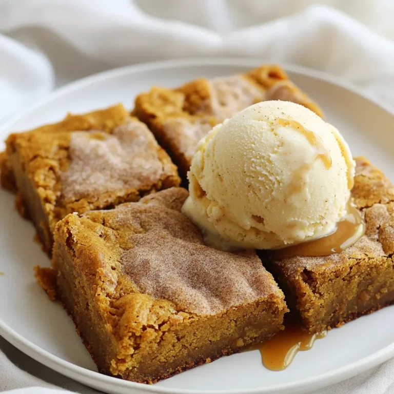 To make Pumpkin Snickerdoodle Blondies, you need the following ingredients: - 1 cup unsalted butter, melted - 1 cup brown sugar, packed - 1/2 cup granulated sugar - 1 cup pumpkin puree - 2 large eggs - 2 teaspoons vanilla extract - 2 cups all-purpose flour - 1 teaspoon baking powder - 1/2 teaspoon baking soda - 1 teaspoon ground cinnamon - 1/2 teaspoon ground nutmeg - 1/4 teaspoon salt - 1/4 cup sugar (for rolling) - 1 tablespoon ground cinnamon (for rolling) These ingredients create a rich, moist, and flavorful treat that’s perfect for fall. You can swap ingredients if you need to. Here are some ideas: - Butter: Use coconut oil for a dairy-free option. It adds a nice flavor. - Pumpkin puree: Sweet potato puree works well too. It will change the taste a bit. - Brown sugar: You can use white sugar, but it may change the texture. - Eggs: For a vegan version, use flax eggs. Mix 1 tablespoon of flaxseed meal with 2.5 tablespoons of water. Let it sit for a few minutes to thicken. These substitutions ensure you can still enjoy the blondies, even with dietary restrictions. Choosing fresh ingredients makes a big difference in flavor. Here are some tips: - Pumpkin puree: Look for 100% pure pumpkin, not pumpkin pie filling. Check the label. - Spices: Buy whole spices and grind them for the best flavor. Freshly ground spices are more potent. - Butter: Use high-quality unsalted butter for the best taste. It will enhance the flavor profile. With fresh ingredients, your Pumpkin Snickerdoodle Blondies will taste even more amazing. To get started, preheat your oven to 350°F (175°C). Grease a 9x13 inch baking pan or use parchment paper. This makes removing the blondies easy later on. In a large bowl, whisk together 1 cup of melted unsalted butter, 1 cup of packed brown sugar, and 1/2 cup of granulated sugar. Mix until it's smooth and combined. Add in 1 cup of pumpkin puree, 2 large eggs, and 2 teaspoons of vanilla extract. Stir until all the wet ingredients blend well. In a separate bowl, sift together 2 cups of all-purpose flour, 1 teaspoon of baking powder, 1/2 teaspoon of baking soda, 1 teaspoon of ground cinnamon, 1/2 teaspoon of ground nutmeg, and 1/4 teaspoon of salt. Slowly add this dry mix to the wet mix. Stir gently just until combined. Avoid overmixing to keep them soft. Spread your blondie batter evenly into the prepared baking pan. In a small bowl, mix 1/4 cup of sugar with 1 tablespoon of cinnamon. Sprinkle this mixture evenly over the top of the batter. Place the pan in the oven and bake for about 25-30 minutes. The edges should look set, and the center should be just firm. To check if your blondies are done, insert a toothpick into the center. If it comes out clean or with a few moist crumbs, they are ready. If you see wet batter, give them a few more minutes. Let the blondies cool in the pan for 15 minutes. Then, transfer them to a wire rack to cool completely before slicing into squares. Enjoy your delicious treat! When baking Pumpkin Snickerdoodle Blondies, a few mistakes can spoil your fun. First, avoid overmixing the batter. This can make your blondies dense. Mix until the flour just disappears. Second, watch the baking time. Check your blondies at 25 minutes. They are done when a toothpick comes out with a few moist crumbs. Lastly, don’t skip the sugar and cinnamon topping. It adds a sweet crunch that makes these treats shine. These blondies are great on their own, but you can make them even better. Serve them warm with vanilla ice cream. The cold ice cream melts into the warm blondies. Drizzle caramel sauce on top for a sweet touch. You can also add a dollop of whipped cream for extra creaminess. For a fun twist, serve them at a fall gathering with apple cider. Want to kick your blondies up a notch? Try adding nuts or chocolate chips. Chopped pecans or walnuts add a nice crunch. If you love chocolate, mix in semi-sweet or white chocolate chips. You can also add dried cranberries or raisins for a fruity burst. These extras make each bite exciting and add depth to the flavors. {{image_2}} You can make gluten-free pumpkin snickerdoodle blondies easily. Replace all-purpose flour with a gluten-free blend. Look for one that has xanthan gum added. This helps bind the blondies. You can also try almond flour or coconut flour. Keep in mind that coconut flour absorbs more liquid. You may need to add an extra egg or some milk. To make these blondies dairy-free, swap the unsalted butter. Use coconut oil or a plant-based butter instead. Both options work well and keep the blondies moist. For the eggs, you can use flax eggs. Mix one tablespoon of flaxseed meal with three tablespoons of water. Let it sit for about five minutes until it thickens. This will help bind the batter just like eggs do. You can get creative with seasonal add-ins. For a tart twist, try adding dried cranberries. They add a nice color and flavor. If you love chocolate, fold in some chocolate chips. Dark or white chocolate works great. You can also sprinkle chopped nuts on top for extra crunch. Get playful with spices too! Add a pinch of ginger or cloves for an extra layer of warmth. To keep your Pumpkin Snickerdoodle Blondies fresh, store them in an airtight container. This helps keep them moist and soft. Place parchment paper between layers if you stack them. This way, they won’t stick together. Always store them at room temperature for the best taste. Avoid putting them in direct sunlight, as heat can dry them out. When stored correctly, these blondies can last about 3 to 5 days. If your kitchen is warm, they may only last 3 days. If you want them to last longer, refrigeration is an option. In the fridge, they can last about a week. Just remember, chilling may change the texture a bit. To freeze your blondies, first, let them cool completely. Cut them into squares and wrap each one tightly in plastic wrap. Then, place them in a freezer-safe bag or container. This helps prevent freezer burn. Your blondies will stay fresh for up to 3 months when frozen. When you want to eat one, take it out and let it thaw at room temperature. Enjoy the taste of fall anytime! If you do not have pumpkin puree, use applesauce. It adds moisture and a nice flavor. Sweet potato puree works well too. You can also try butternut squash puree for a different taste. Yes, you can make these blondies ahead. Bake them and let them cool completely. Store them in an airtight container. They will stay fresh for about a week at room temperature. To check if the blondies are done, insert a toothpick into the center. If it comes out clean or with a few moist crumbs, they are ready. If the toothpick is wet, bake them a little longer. Keep an eye on them to avoid overbaking. You now have a solid guide to making delicious blondies. We covered the key ingredients, including substitutions and tips for choosing the best options. I shared step-by-step instructions for preparation and baking, plus how to spot when they're perfect. We also explored common mistakes and tasty variations. Don't forget about storage tips to keep them fresh longer. With these insights, you're ready to create your own amazing blondies. Happy baking!