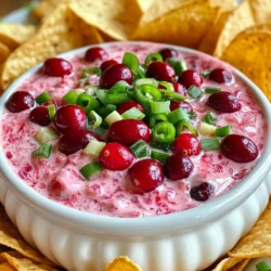 To make the perfect Cranberry Jalapeño Dip, gather these items: - 1 cup fresh cranberries (or frozen, thawed) - 1 jalapeño, seeded and finely chopped - 1/2 cup cream cheese, softened - 1/2 cup sour cream - 1/4 cup mayonnaise - 1 tablespoon fresh lime juice - 1 teaspoon garlic powder - Salt and pepper to taste - 1/4 cup green onions, chopped (for garnish) - Tortilla chips or crackers for serving These ingredients create a tasty dip that blends sweet and spicy. You can customize this dip with these optional add-ins: - Chopped cilantro for a fresh taste - A splash of hot sauce for extra heat - Crumbled bacon for a smoky flavor - Diced bell peppers for added crunch Feel free to mix and match based on your taste. This dip is great as is, but you can make some easy changes: - Use low-fat cream cheese or sour cream for a lighter version. - Substitute Greek yogurt for sour cream for more protein. - For a vegan dip, use plant-based cream cheese and mayo. These swaps keep the flavor while fitting different diets. {{ingredient_image_1}} To start, rinse the cranberries. Use cold water to wash them well. Remove any that look bad. If you're using frozen cranberries, make sure they are thawed and drained. This step is key to keep the dip from being too watery. You want fresh, bright cranberries that bring a nice tart taste. Next, grab a mixing bowl. Add the softened cream cheese, sour cream, and mayonnaise. These will make your dip creamy. Then, squeeze in the fresh lime juice. Add the garlic powder, salt, and pepper. Use a hand mixer or a fork to whip everything until it’s smooth and creamy. The creaminess will balance the tartness of the cranberries. Now, fold the cranberry and jalapeño mix into the creamy base. Use a spatula to mix gently so you don’t smash the cranberries too much. Make sure everything is well combined. Taste the dip and adjust the seasoning. You might want more salt, pepper, or lime juice. Once it tastes just right, transfer it to a serving bowl. Cover it with plastic wrap and chill for at least 30 minutes. This helps the flavors blend together. Before you serve, sprinkle chopped green onions on top for a nice touch. You can change the heat of this dip. To make it milder, remove the seeds and ribs from the jalapeño. If you like more heat, add a second jalapeño or leave the seeds in. For a fun twist, try using a hotter pepper like serrano. Taste the dip as you mix to find the right heat for you. Finding a good balance of flavors is key. The tartness of cranberries needs to shine. Lime juice adds brightness, so don’t skip it. If the dip tastes too tart, add a pinch of sugar. If it’s too rich, add more lime juice. Always taste as you go to ensure it meets your liking. Serving matters! Use a colorful bowl to show off the dip. Surround it with a variety of tortilla chips and crackers. You can add whole cranberries or chopped green onions on top for a fresh look. A sprinkle of lime zest can also brighten the dish. Make it fun and inviting for your guests! Pro Tips Chill for Flavor: Allow the dip to chill for at least 30 minutes before serving to enhance the flavors. Jalapeño Adjustments: If you prefer a milder dip, remove the seeds from the jalapeño or use less of it. Texture Preference: For a smoother dip, blend the cranberry mixture longer until you reach your desired consistency. Serving Suggestions: Pair with a mix of tortilla chips and colorful veggies for a festive presentation. {{image_2}} You can make your dip even spicier. Add more jalapeños if you like heat. You can also use pickled jalapeños for a tangy twist. For an extra kick, mix in some cayenne pepper. This adds warmth without changing the dip's flavor too much. To make the dip vegetarian, simply skip the cream cheese and sour cream. Instead, use cashew cream or a homemade tofu blend. This keeps the dip rich and creamy. For a vegan option, check the mayonnaise label. Choose a vegan mayo to keep it plant-based while still tasty. You can change the dip with seasonal flavors. In fall, add chopped apples or pears for sweetness. In winter, mix in dried cranberries or nuts for crunch. Spring brings fresh herbs like cilantro or mint. In summer, add diced mango or pineapple for a refreshing touch. Each twist can make your dip unique and fun! To keep your cranberry jalapeño dip fresh, store it in an airtight container. This helps prevent it from absorbing other smells in the fridge. Make sure to refrigerate it within two hours of making it. The dip stays good for about three days. If you notice any changes in smell or texture, it’s best to toss it. You can freeze this dip, but it may change texture. To freeze, place the dip in a freezer-safe container. Leave some space at the top for expansion. Seal it tightly and label it with the date. It can last up to three months in the freezer. When you're ready to use it, thaw it in the fridge overnight. Stir it well before serving. If you want to warm up your dip, use a microwave or oven. For the microwave, heat it in short bursts. Stir after each burst until it’s warm. If using an oven, place the dip in an oven-safe dish and cover it with foil. Heat at 350°F for about 15-20 minutes. Stir before serving to ensure even warmth. Yes, you can make this dip ahead of time. I recommend preparing it a day before your event. This dip tastes even better after chilling. Just cover it well and store it in the fridge. The flavors mix and become more intense. To add more heat, use extra jalapeños. You can also leave some seeds in the peppers. If you want a smoky flavor, try adding a dash of chipotle powder. Another option is to mix in hot sauce. Taste as you go to find the right heat for you. This dip goes great with tortilla chips or crackers. You can also serve it with sliced veggies like bell peppers or cucumbers. For a fun twist, use pita chips or breadsticks. The dip’s creaminess pairs well with crunchy items. Add some colorful options for a beautiful spread. This blog post covered how to make a delicious Cranberry Jalapeño Dip. We explored the essential ingredients, preparation steps, and handy tips for perfecting flavors. I also shared fun variations and smart storage methods. Remember, you can adjust spice levels and try creative add-ins to suit your taste. With the right techniques, this dip will impress your guests. Enjoy making and sharing your flavorful creation!