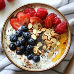 To make a high-protein yogurt bowl, you need a few key items. Here’s what to gather: - 1 cup Greek yogurt (plain, low-fat or non-fat) - 1/2 cup cottage cheese - 1 scoop protein powder (vanilla or your choice) - 1 tablespoon chia seeds - 1 tablespoon honey or maple syrup (to taste) - 1/2 cup mixed berries (strawberries, blueberries, raspberries) - 1/4 cup sliced almonds or walnuts You can add some optional items for extra flavor and nutrition: - 1 tablespoon hemp seeds (optional for extra protein) - A sprinkle of cinnamon (optional) Let’s break down the benefits of each ingredient: - Greek yogurt: Packed with protein and probiotics, it supports gut health. - Cottage cheese: High in protein and calcium, it promotes muscle growth and bone health. - Protein powder: Boosts protein intake, helping with recovery and muscle repair. - Chia seeds: Rich in fiber, omega-3s, and antioxidants, they aid digestion. - Honey or maple syrup: Natural sweeteners that provide quick energy. - Mixed berries: Full of vitamins and antioxidants, they enhance overall health. - Sliced almonds or walnuts: Offer healthy fats and protein, great for heart health. - Hemp seeds: Provide extra protein and essential fatty acids for energy. - Cinnamon: Adds flavor and may help regulate blood sugar levels. By using these ingredients, you create a tasty dish that fuels you. Customize it to fit your taste, and enjoy the health benefits! {{ingredient_image_1}} Start by gathering your ingredients. You will need: - 1 cup Greek yogurt (plain, low-fat or non-fat) - 1/2 cup cottage cheese - 1 scoop protein powder (vanilla or your choice) - 1 tablespoon chia seeds - 1 tablespoon honey or maple syrup (to taste) - 1/2 cup mixed berries (strawberries, blueberries, raspberries) - 1/4 cup sliced almonds or walnuts - 1 tablespoon hemp seeds (optional for extra protein) - A sprinkle of cinnamon (optional) 1. In a medium mixing bowl, combine Greek yogurt, cottage cheese, and protein powder. 2. Mix well until the mixture is smooth and creamy. 3. Next, stir in the chia seeds and honey or maple syrup. Adjust the sweetness to your liking. 4. Divide the yogurt mixture evenly into serving bowls. 5. Top each bowl with mixed berries, nuts, and hemp seeds for a nutritious boost. 6. If you like, add a pinch of cinnamon on top for extra flavor. 7. Serve the bowls right away. Enjoy your tasty, high-protein yogurt bowl! To get the best texture, mix gently but well. Use a sturdy whisk or a spatula. - Start with the yogurt and cottage cheese. Blend until smooth. - When adding the protein powder, mix until no lumps remain. - Chia seeds can clump together. Stir them in slowly to avoid this. - If you want a thinner consistency, add a splash of milk or water. Make your yogurt bowl look great with colorful toppings. Here are some fun ideas: - Use a variety of berries for a burst of color. - Arrange nuts in a circle on top for a pretty look. - Drizzle honey or maple syrup in a zigzag pattern. - Add a few mint leaves for a fresh touch. You can serve this bowl as breakfast, a snack, or even dessert! When picking yogurt, I suggest Greek yogurt. It has more protein than regular yogurt. Look for plain, low-fat, or non-fat options. These types keep added sugars low. Each cup packs a protein punch of about 20 grams. This makes it a great choice for a filling meal. Choosing a sweetener is fun! Honey is thick and rich, adding a nice flavor. Maple syrup is lighter and has a unique taste. Both options work well in your yogurt bowl. I usually start with one tablespoon. You can always add more if you want it sweeter. Just taste as you go! Your yogurt bowl is a blank canvas! You can add fruits like bananas or peaches. Nuts like walnuts or pecans bring a nice crunch. Seeds, such as flax or pumpkin, boost nutrition. You can even sprinkle some cocoa powder for a chocolate twist. Don't be afraid to mix and match until you find your favorite combo! Pro Tips Choose Your Yogurt Wisely: Opt for plain Greek yogurt to avoid added sugars and keep the protein content high. Customize Your Sweetness: Adjust the amount of honey or maple syrup based on your taste preference and dietary needs. Add More Fiber: Include a tablespoon of flaxseeds or oats for an extra boost of fiber and nutrition. Make It a Meal: Enhance this yogurt bowl by adding a scoop of nut butter for healthy fats and more staying power. {{image_2}} You can change the taste of your yogurt bowl easily. For a tropical twist, use pineapple and mango. Add coconut flakes for extra flavor. You can also try a chocolate version by mixing cocoa powder into the yogurt. Top it with dark chocolate chips for a treat. If you love nuts, add almond butter or peanut butter to your bowl. It adds great taste and protein. If you want a dairy-free option, use almond or coconut yogurt. These choices still taste great. For protein, mix in silken tofu or plant-based protein powder. You can also add dairy-free cottage cheese for texture. Sweeten your bowl with agave syrup or maple syrup for a vegan-friendly option. Fresh fruits make your yogurt bowl fun and tasty. In spring, try strawberries and kiwis. Summer is great for peaches and blueberries. In fall, add apples and pears. Lastly, in winter, you can use pomegranate seeds or citrus fruits. Don’t forget to top with seeds, nuts, or granola for extra crunch! Each season brings new flavors to enjoy. To keep your yogurt bowl fresh, store it in an airtight container. Use a glass or plastic container with a tight lid. This helps prevent spills and keeps the yogurt from absorbing smells. If you have toppings, store them separately. This way, they stay crunchy and fresh. When stored properly, a yogurt bowl lasts about 2 to 3 days in the fridge. After that, the taste and texture may change. If you notice any off smells or colors, it’s best to toss it out. Always trust your senses when it comes to food safety. You can freeze yogurt bowls, but it alters the texture. The yogurt may become grainy when thawed. If you want to try freezing, scoop the yogurt mix into ice cube trays or small containers. To enjoy later, just thaw it in the fridge overnight. Add fresh toppings before you eat. The best yogurt is Greek yogurt. It has more protein than regular yogurt. Choose plain, low-fat, or non-fat Greek yogurt for the best taste and health benefits. This yogurt works great in a high-protein bowl. It gives you creamy texture and rich flavor. Yes, you can prepare this yogurt bowl ahead of time. Mix the yogurt, cottage cheese, and protein powder. Store this base in the fridge for up to two days. Just add toppings right before you eat. This keeps the fruits and nuts fresh and crunchy. You can boost protein by adding more cottage cheese or protein powder. Try adding a tablespoon of hemp seeds for extra protein. Chia seeds also help, and they add fiber. You can even top with a scoop of nut butter for a tasty kick! Creating a high-protein yogurt bowl is simple and rewarding. You can mix quality ingredients for great taste and nutrition. Use the tips and steps I outlined to create your perfect bowl. Remember, you can customize flavors, add toppings, and enjoy it any time. Whether you prefer dairy or plant-based options, there’s a yogurt bowl for you. Enjoy storing and serving your creation. Embrace the variety and have fun with it! A delicious, healthy meal is just a bowl away.